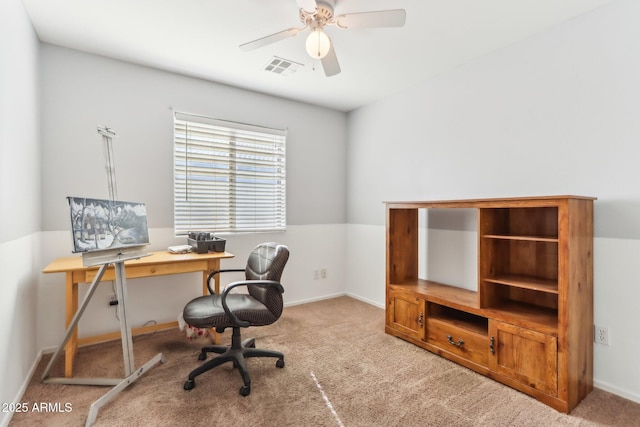 office with ceiling fan and light carpet