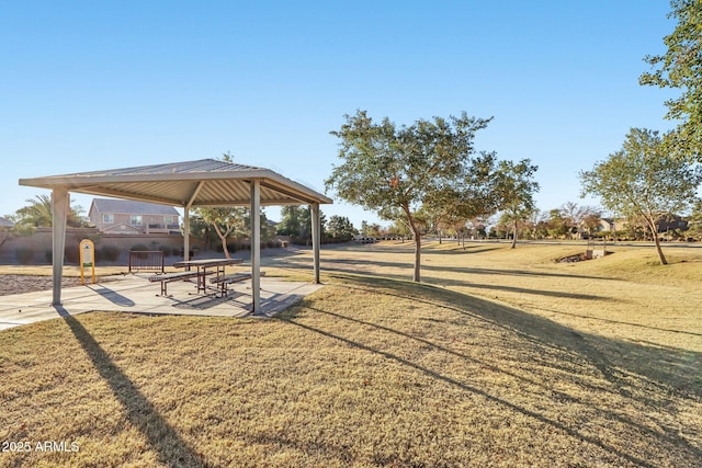 view of property's community with a gazebo and a lawn