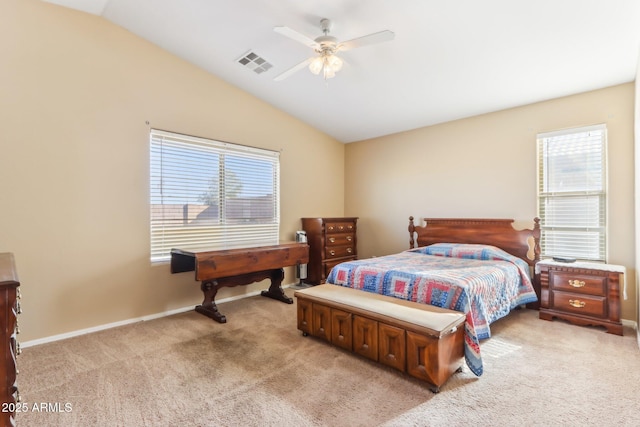 bedroom featuring light carpet, ceiling fan, and vaulted ceiling