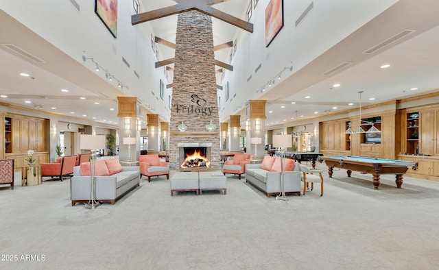 carpeted living room with recessed lighting, a fireplace, billiards, a towering ceiling, and visible vents