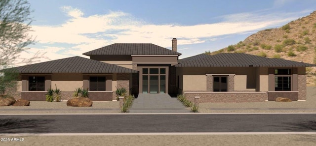 3545 N Vista Way Unit 404, Buckeye, AZ 85396 - view of front facade with a chimney and stucco siding