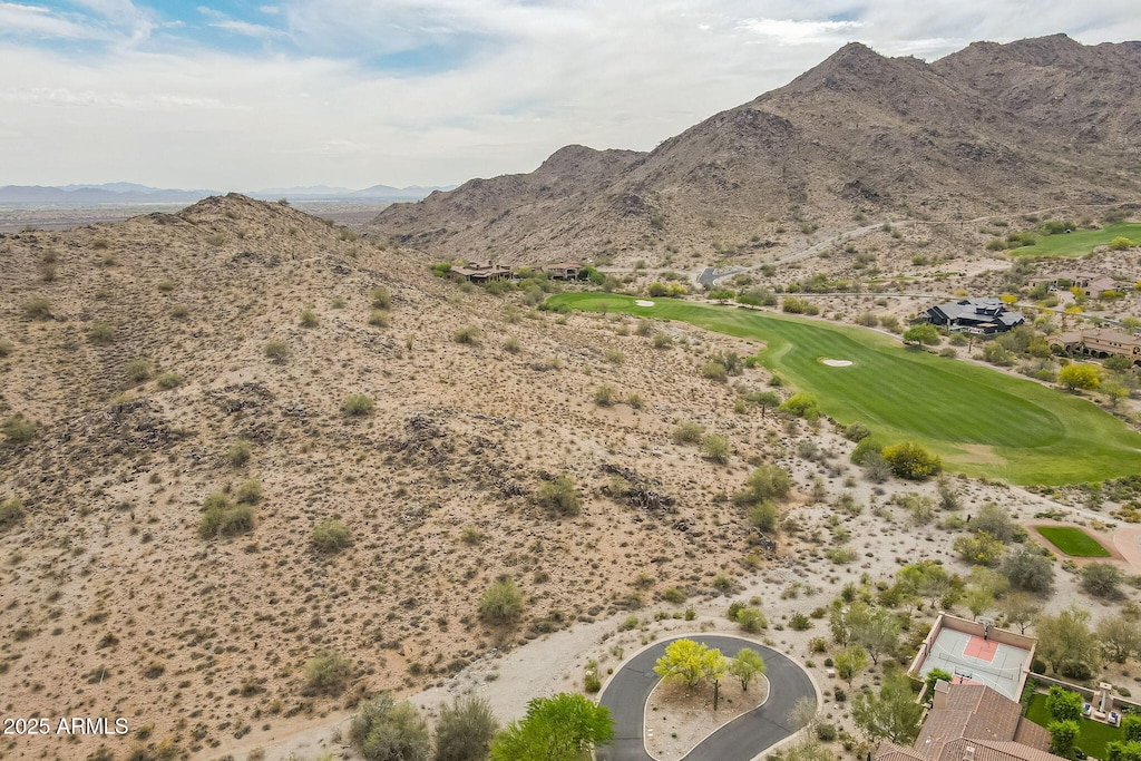 3545 N Vista Way Unit 404, Buckeye, AZ 85396 - view of mountain backdrop with a golf club and a desert landscape