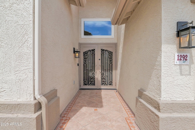 1292 N Renee Ave, Gilbert, AZ 85234 - doorway to property with french doors and stucco siding