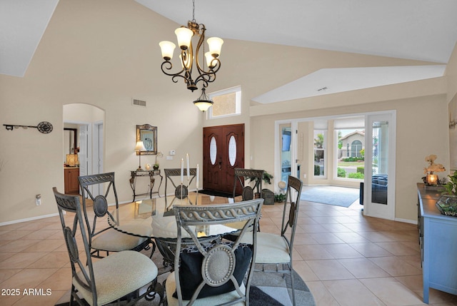 1292 N Renee Ave, Gilbert, AZ 85234 - dining room featuring light tile patterned floors, high vaulted ceiling, arched walkways, a chandelier, and baseboards