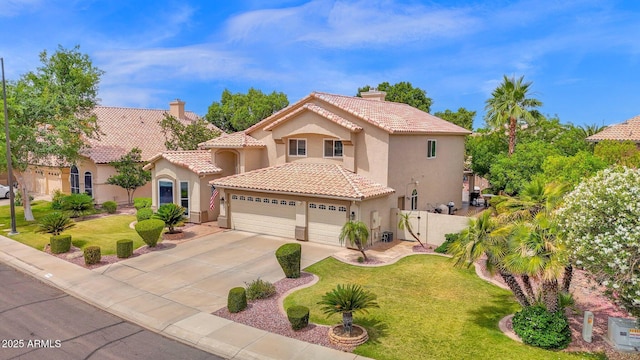 1292 N Renee Ave, Gilbert, AZ 85234 - mediterranean / spanish home with stucco siding, a tile roof, driveway, a garage, and a gate
