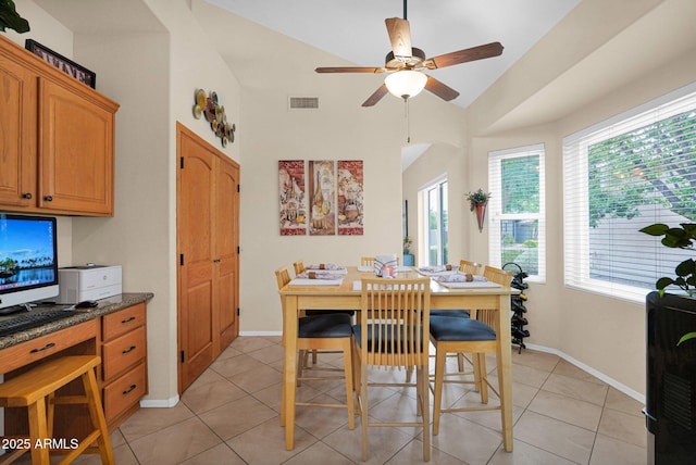1292 N Renee Ave, Gilbert, AZ 85234 - dining area with ceiling fan, light tile patterned flooring, baseboards, and high vaulted ceiling