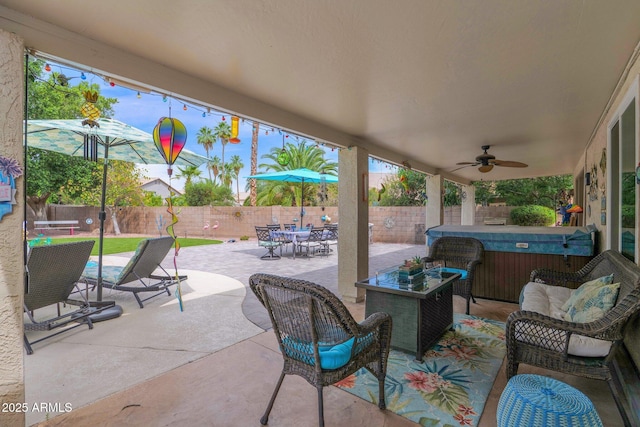 1292 N Renee Ave, Gilbert, AZ 85234 - fenced backyard with a hot tub, a patio, ceiling fan, an outdoor living space, and outdoor dining area