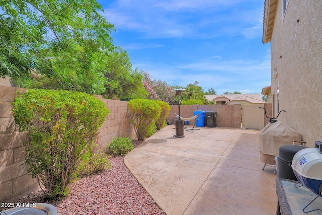 1292 N Renee Ave, Gilbert, AZ 85234 - fenced backyard featuring a patio area and a gate