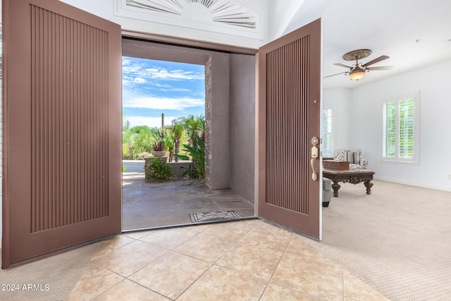 9845 E Inglewood St, Mesa, AZ 85207 - carpeted foyer featuring tile patterned flooring and ceiling fan