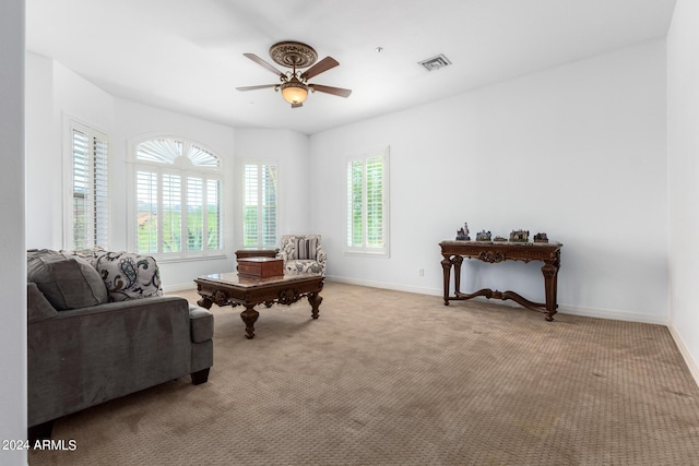 9845 E Inglewood St, Mesa, AZ 85207 - living area with a ceiling fan, carpet, visible vents, and baseboards