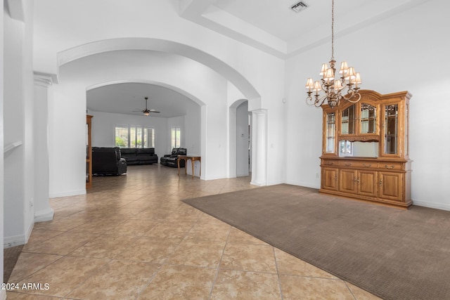 9845 E Inglewood St, Mesa, AZ 85207 - interior space featuring arched walkways, ceiling fan, light tile patterned flooring, light carpet, and visible vents