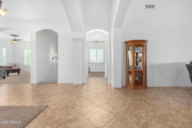 9845 E Inglewood St, Mesa, AZ 85207 - spare room featuring ceiling fan, decorative columns, arched walkways, and visible vents