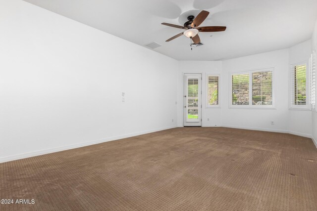 9845 E Inglewood St, Mesa, AZ 85207 - unfurnished room with ceiling fan, carpet floors, visible vents, and baseboards