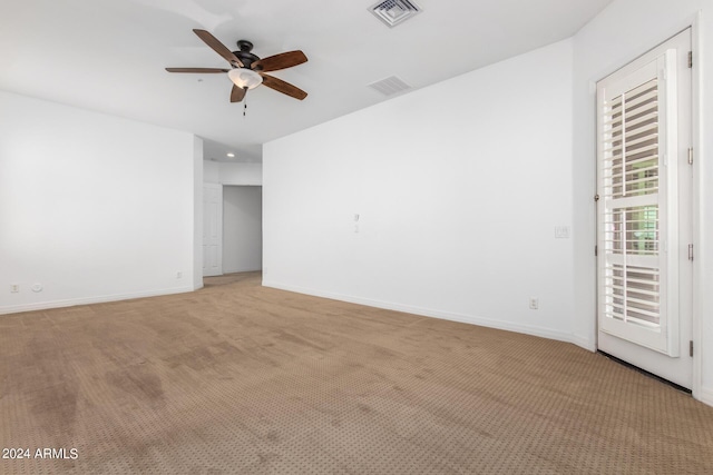 9845 E Inglewood St, Mesa, AZ 85207 - unfurnished room with light carpet, baseboards, and visible vents