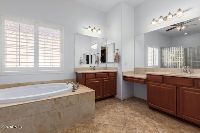 9845 E Inglewood St, Mesa, AZ 85207 - full bath featuring a garden tub, ceiling fan, a sink, and tile patterned floors