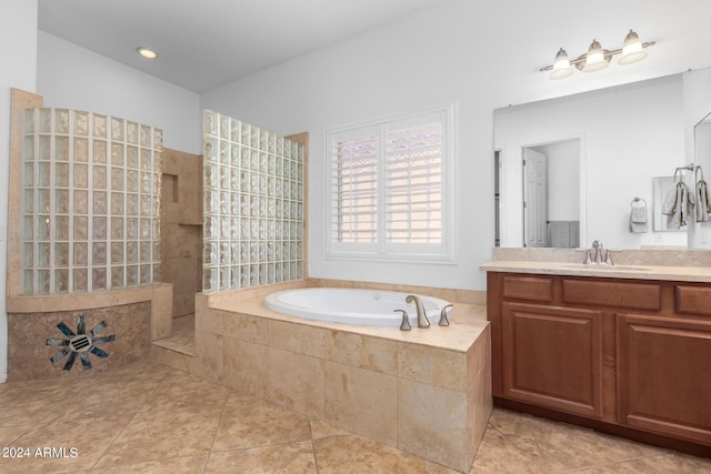 9845 E Inglewood St, Mesa, AZ 85207 - full bathroom with tile patterned floors, walk in shower, a bath, and vanity