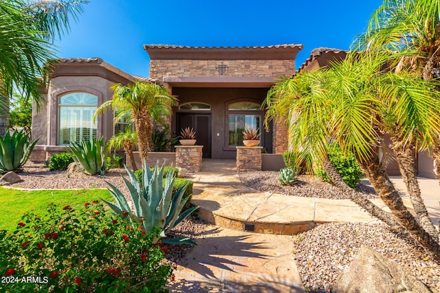 9845 E Inglewood St, Mesa, AZ 85207 - property entrance featuring stone siding and stucco siding