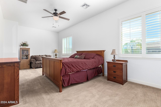 9845 E Inglewood St, Mesa, AZ 85207 - bedroom featuring light carpet, a ceiling fan, visible vents, and baseboards
