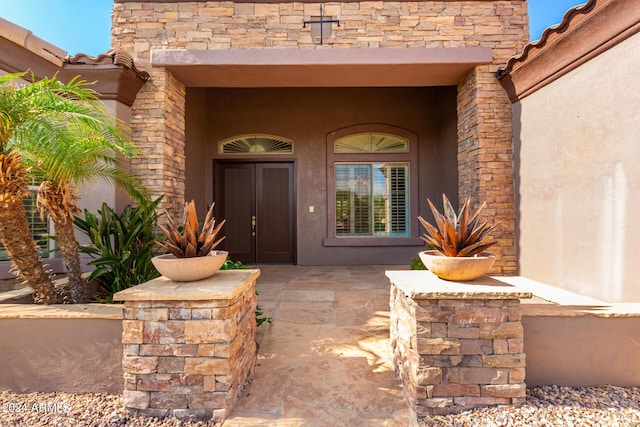 9845 E Inglewood St, Mesa, AZ 85207 - view of exterior entry featuring stone siding and stucco siding