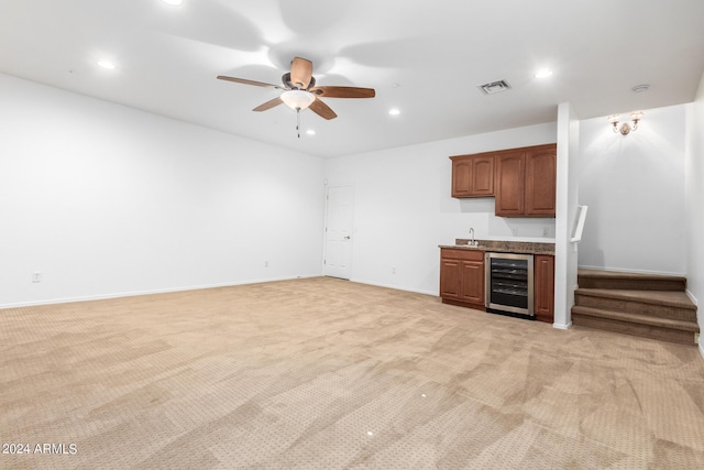 9845 E Inglewood St, Mesa, AZ 85207 - interior space with wine cooler, light carpet, ceiling fan, and recessed lighting