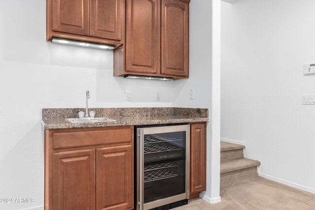 9845 E Inglewood St, Mesa, AZ 85207 - bar with wine cooler, light colored carpet, a sink, wet bar, and baseboards