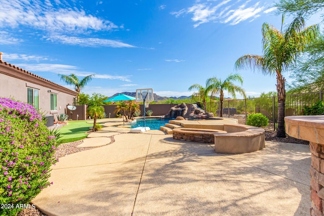 9845 E Inglewood St, Mesa, AZ 85207 - view of patio / terrace with a fenced backyard, a fenced in pool, and a hot tub