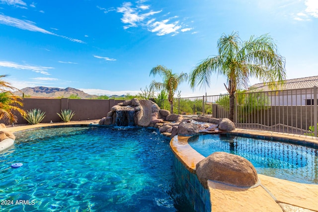 9845 E Inglewood St, Mesa, AZ 85207 - view of swimming pool with a fenced in pool, fence, and a mountain view