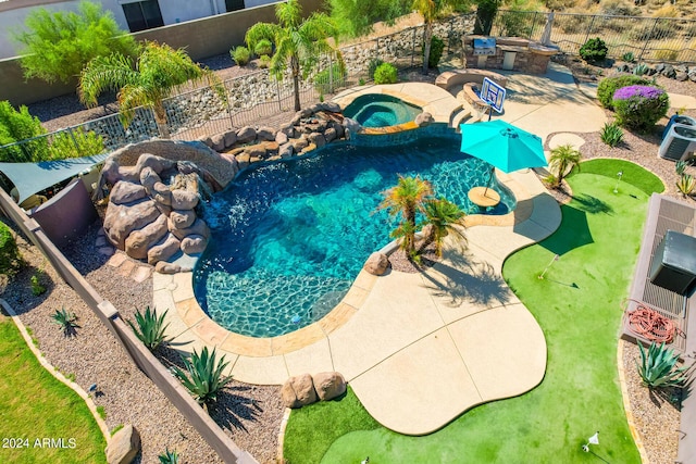 9845 E Inglewood St, Mesa, AZ 85207 - view of swimming pool with a patio area, a fenced backyard, a pool with connected hot tub, and area for grilling