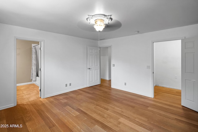 235 El Camino Grande, Sedona, AZ 86336 - unfurnished bedroom with light wood-style floors and baseboards