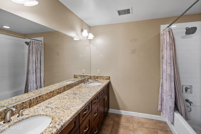235 El Camino Grande, Sedona, AZ 86336 - bathroom featuring shower / tub combo, double vanity, baseboards, and tile patterned floors