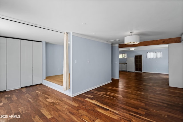 235 El Camino Grande, Sedona, AZ 86336 - unfurnished living room featuring wood finished floors and baseboards