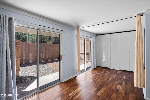 235 El Camino Grande, Sedona, AZ 86336 - unfurnished bedroom with access to exterior and wood finished floors
