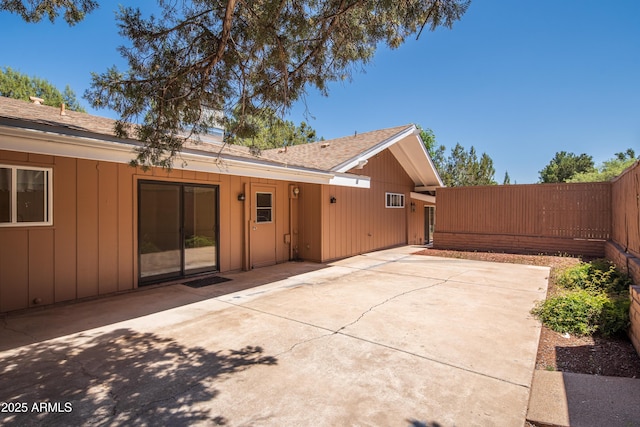 235 El Camino Grande, Sedona, AZ 86336 - rear view of property with a patio, board and batten siding, and roof with shingles