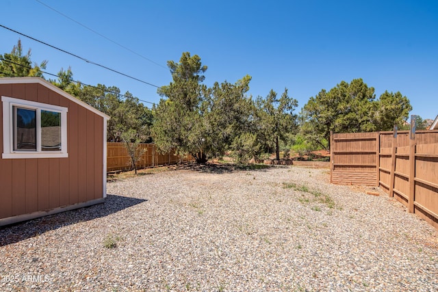 235 El Camino Grande, Sedona, AZ 86336 - fenced backyard with an outbuilding