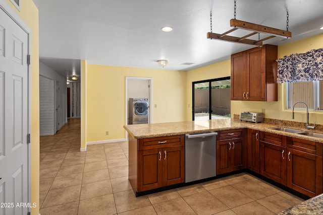 235 El Camino Grande, Sedona, AZ 86336 - kitchen with dishwasher, washer / dryer, a sink, a peninsula, and recessed lighting