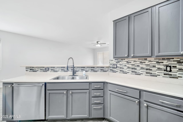 7207 W Alta Vista Rd, Laveen, AZ 85339 - kitchen with dishwasher, gray cabinets, tasteful backsplash, ceiling fan, and light countertops