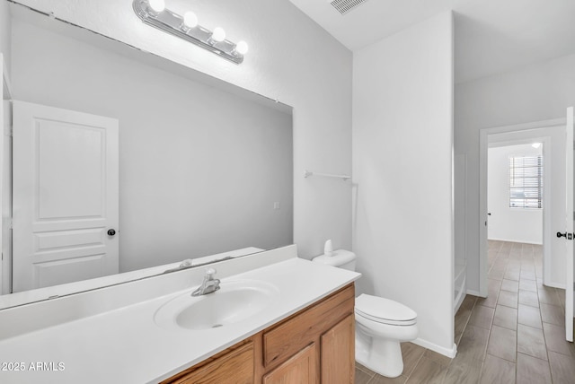 7207 W Alta Vista Rd, Laveen, AZ 85339 - bathroom with toilet and vanity