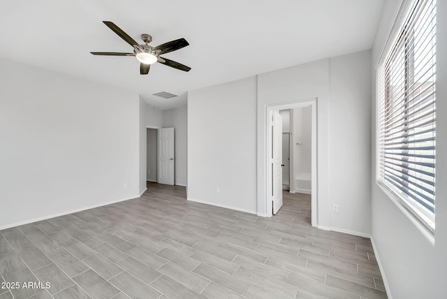7207 W Alta Vista Rd, Laveen, AZ 85339 - unfurnished room with a ceiling fan and baseboards