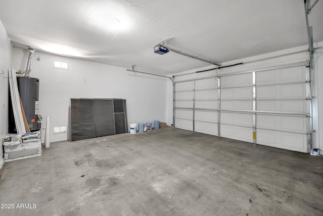 7207 W Alta Vista Rd, Laveen, AZ 85339 - garage featuring a garage door opener and water heater
