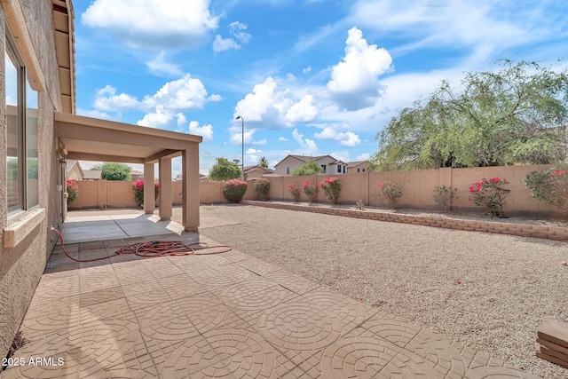 7207 W Alta Vista Rd, Laveen, AZ 85339 - fenced backyard with a patio