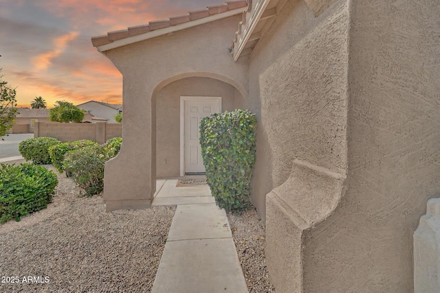 7207 W Alta Vista Rd, Laveen, AZ 85339 - view of exterior entry featuring stucco siding