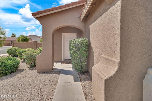 7207 W Alta Vista Rd, Laveen, AZ 85339 - view of exterior entry with stucco siding
