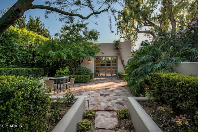 exterior space with a patio and french doors