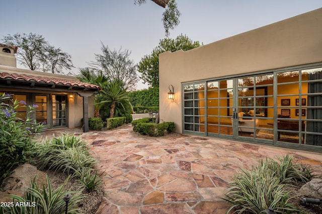 view of patio featuring french doors