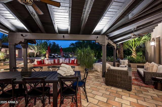 view of patio / terrace featuring a ceiling fan, an outdoor living space, and outdoor dining area