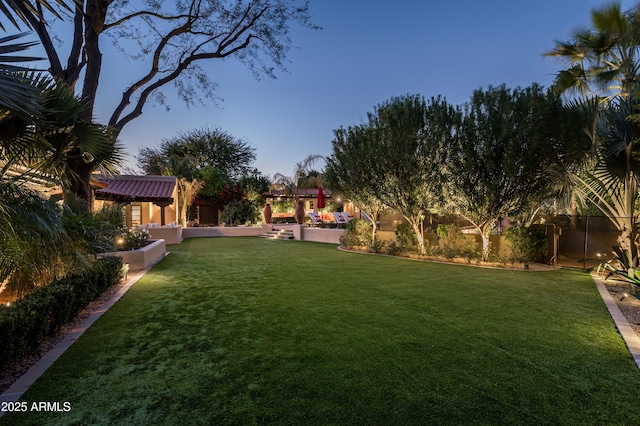 view of yard with a pergola and fence