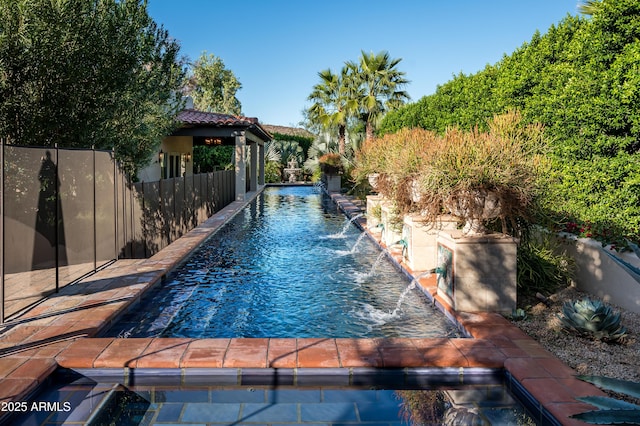 view of pool featuring fence and a fenced in pool