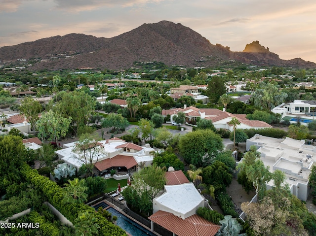 birds eye view of property with a residential view and a mountain view