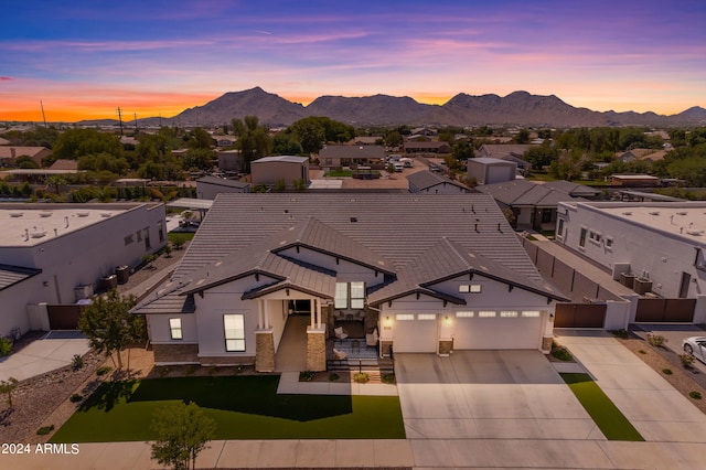 aerial view at dusk with a mountain view