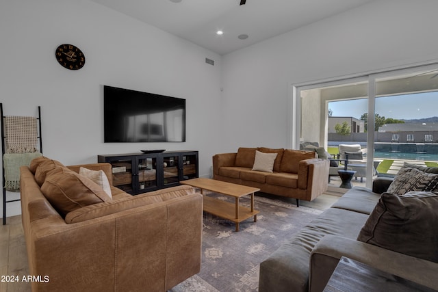 living room with light hardwood / wood-style flooring